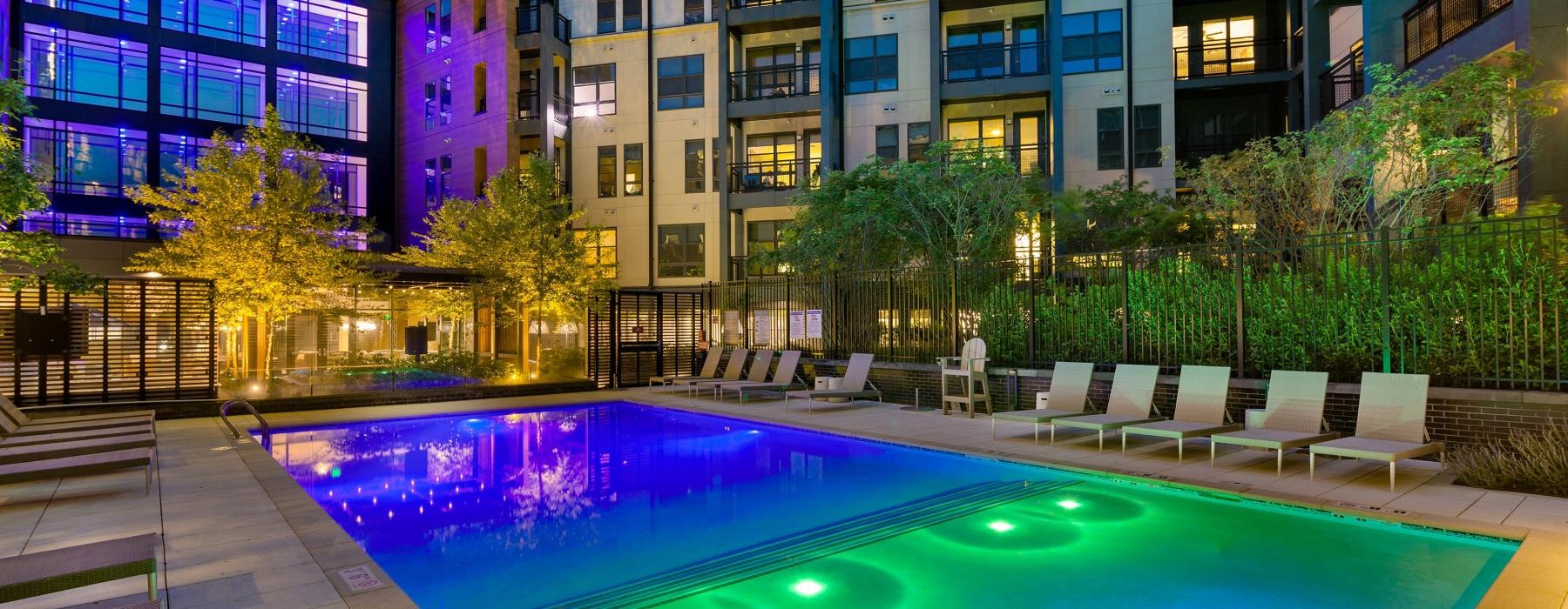 a pool in front of a building